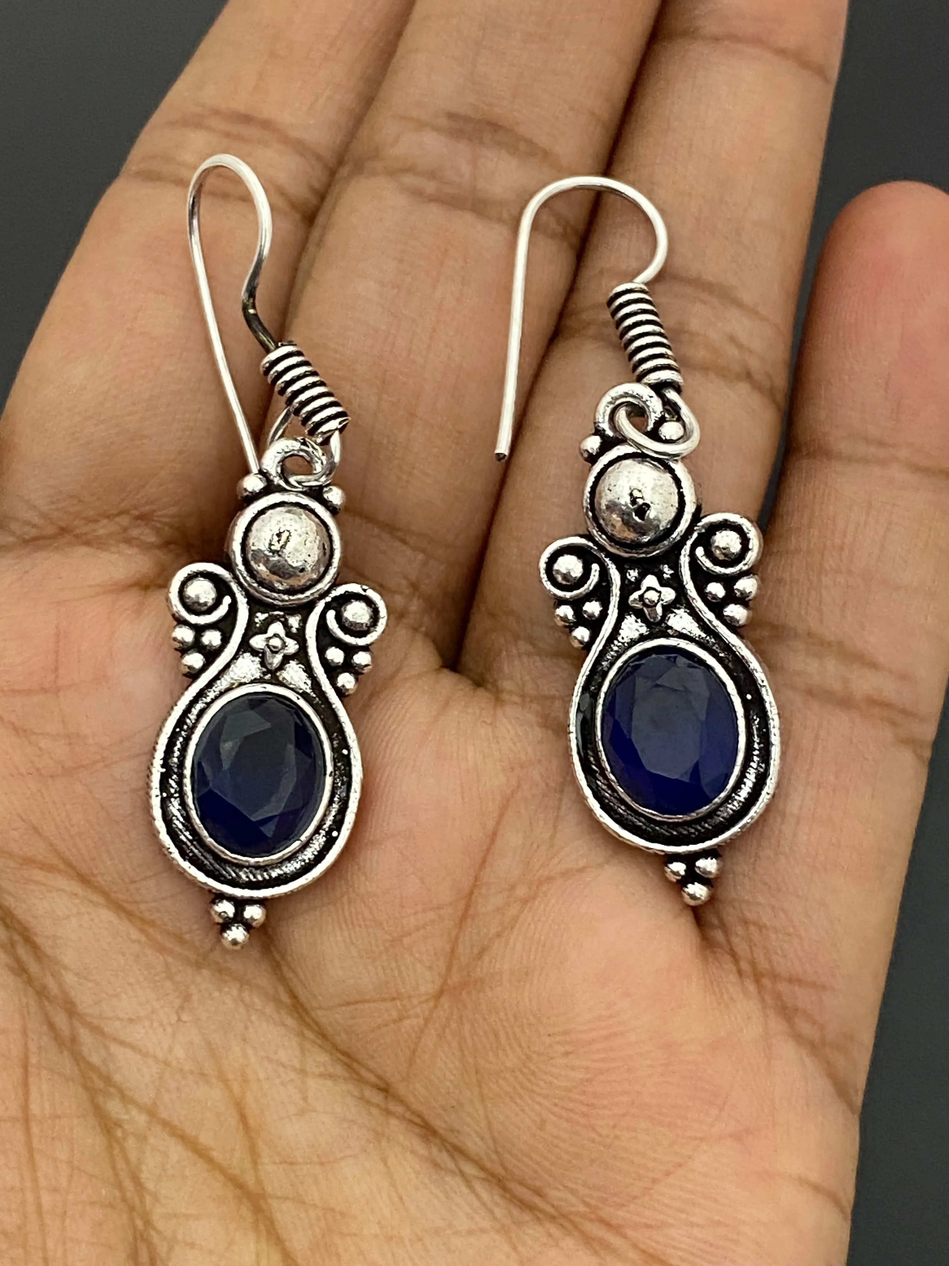 Fascinating Oval Shaped Blue Stone Beaded Silver Toned Oxidized Hook Earrings